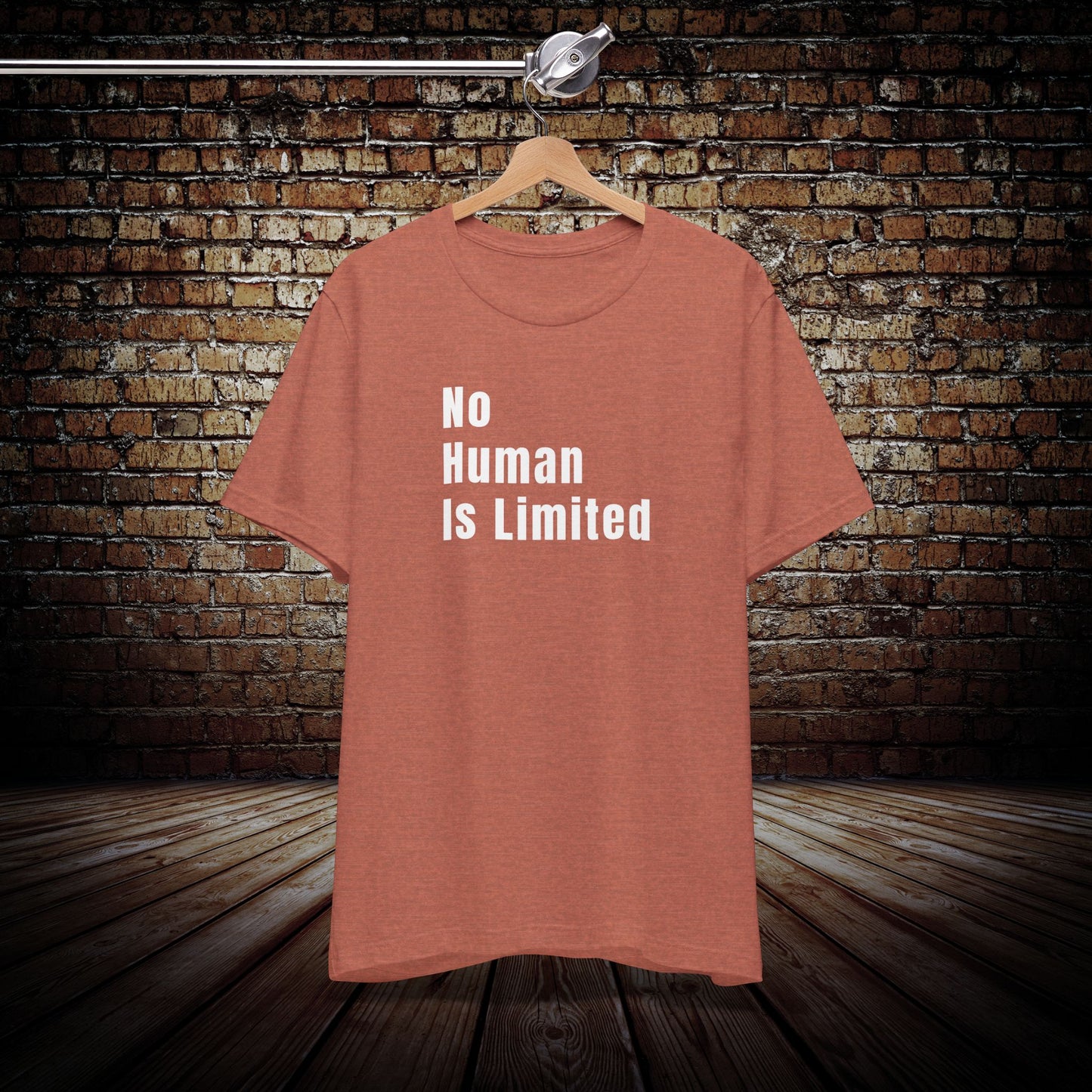 No Human is Limited Graphic Tee